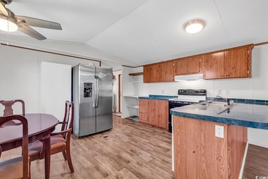 In this well-manicured and gated community of The Parks at Long on Long Bay Club in South Carolina - for sale on GolfHomes.com, golf home, golf lot