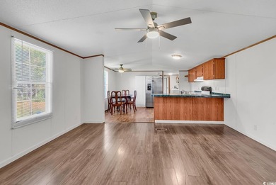 In this well-manicured and gated community of The Parks at Long on Long Bay Club in South Carolina - for sale on GolfHomes.com, golf home, golf lot