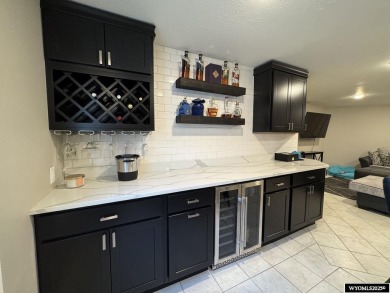 This beautifully updated 4-bedroom, 3-bathroom home at 3749 on  in Wyoming - for sale on GolfHomes.com, golf home, golf lot