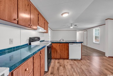 In this well-manicured and gated community of The Parks at Long on Long Bay Club in South Carolina - for sale on GolfHomes.com, golf home, golf lot