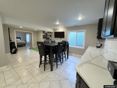 This beautifully updated 4-bedroom, 3-bathroom home at 3749 on  in Wyoming - for sale on GolfHomes.com, golf home, golf lot