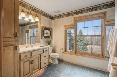 This luxurious residence epitomizes upscale living with stunning on Legends Club in Minnesota - for sale on GolfHomes.com, golf home, golf lot