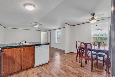 In this well-manicured and gated community of The Parks at Long on Long Bay Club in South Carolina - for sale on GolfHomes.com, golf home, golf lot