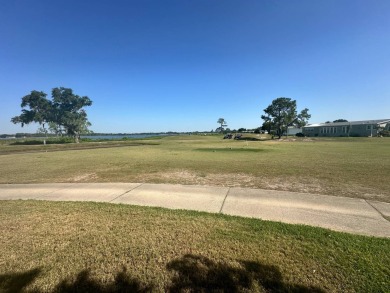 Lakefront  AT FOUR LAKES! 2001 Jacobsen  Lot 658 | $130,000 | 3 on Four Lakes Golf Club in Florida - for sale on GolfHomes.com, golf home, golf lot