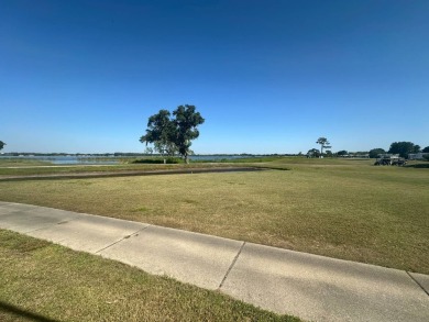 Lakefront  AT FOUR LAKES! 2001 Jacobsen  Lot 658 | $130,000 | 3 on Four Lakes Golf Club in Florida - for sale on GolfHomes.com, golf home, golf lot
