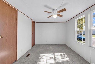 In this well-manicured and gated community of The Parks at Long on Long Bay Club in South Carolina - for sale on GolfHomes.com, golf home, golf lot