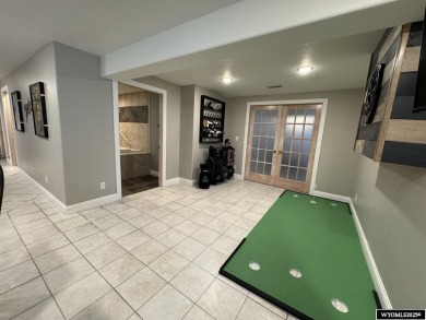 This beautifully updated 4-bedroom, 3-bathroom home at 3749 on  in Wyoming - for sale on GolfHomes.com, golf home, golf lot