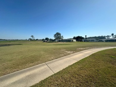 Lakefront  AT FOUR LAKES! 2001 Jacobsen  Lot 658 | $130,000 | 3 on Four Lakes Golf Club in Florida - for sale on GolfHomes.com, golf home, golf lot