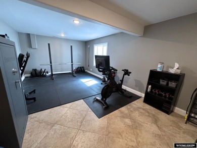 This beautifully updated 4-bedroom, 3-bathroom home at 3749 on  in Wyoming - for sale on GolfHomes.com, golf home, golf lot