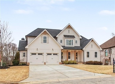 Welcome to a home that truly raises the bar in Traditions of on Traditions of Braselton Golf Club in Georgia - for sale on GolfHomes.com, golf home, golf lot