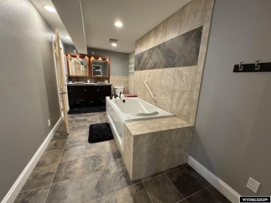 This beautifully updated 4-bedroom, 3-bathroom home at 3749 on  in Wyoming - for sale on GolfHomes.com, golf home, golf lot