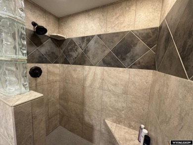 This beautifully updated 4-bedroom, 3-bathroom home at 3749 on  in Wyoming - for sale on GolfHomes.com, golf home, golf lot