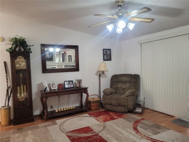 This very well-maintained pet free 3-bedroom 2 bath home in on Zellwood Station Country Club in Florida - for sale on GolfHomes.com, golf home, golf lot