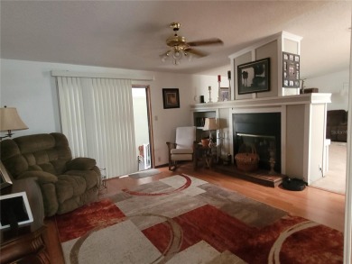 This very well-maintained pet free 3-bedroom 2 bath home in on Zellwood Station Country Club in Florida - for sale on GolfHomes.com, golf home, golf lot