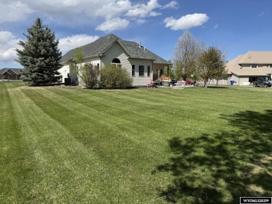 This beautifully updated 4-bedroom, 3-bathroom home at 3749 on  in Wyoming - for sale on GolfHomes.com, golf home, golf lot