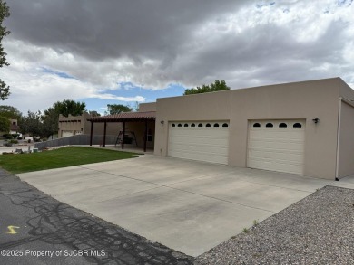 Quality home on the 11th fairway featuring 12 foot ceilings, gas on San Juan Country Club in New Mexico - for sale on GolfHomes.com, golf home, golf lot