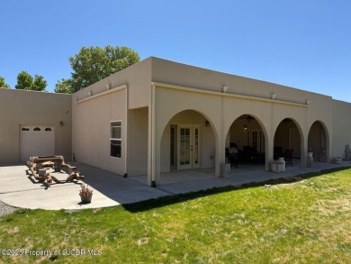 Quality home on the 11th fairway featuring 12 foot ceilings, gas on San Juan Country Club in New Mexico - for sale on GolfHomes.com, golf home, golf lot