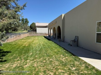 Quality home on the 11th fairway featuring 12 foot ceilings, gas on San Juan Country Club in New Mexico - for sale on GolfHomes.com, golf home, golf lot