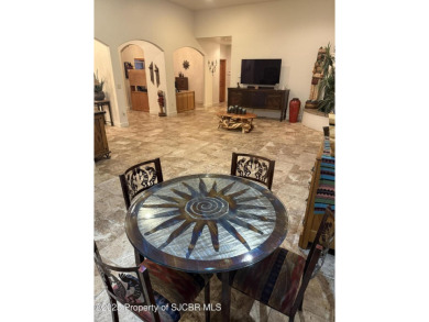 Quality home on the 11th fairway featuring 12 foot ceilings, gas on San Juan Country Club in New Mexico - for sale on GolfHomes.com, golf home, golf lot
