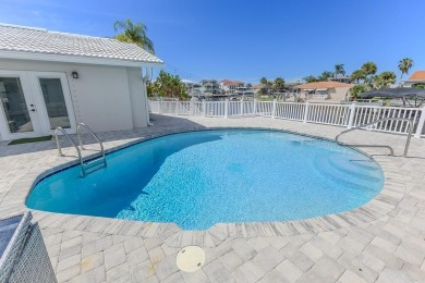 Coastal luxury meets resort-style living in this updated 3,000 on Gulf Harbors Golf Course in Florida - for sale on GolfHomes.com, golf home, golf lot