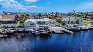 Coastal luxury meets resort-style living in this updated 3,000 on Gulf Harbors Golf Course in Florida - for sale on GolfHomes.com, golf home, golf lot
