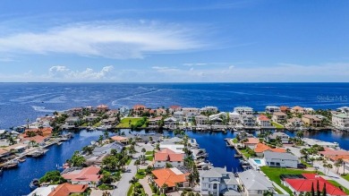 Coastal luxury meets resort-style living in this updated 3,000 on Gulf Harbors Golf Course in Florida - for sale on GolfHomes.com, golf home, golf lot