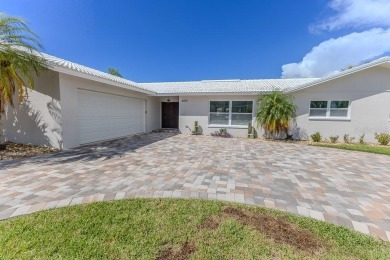Coastal luxury meets resort-style living in this updated 3,000 on Gulf Harbors Golf Course in Florida - for sale on GolfHomes.com, golf home, golf lot