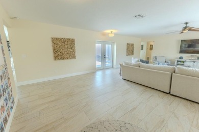 Coastal luxury meets resort-style living in this updated 3,000 on Gulf Harbors Golf Course in Florida - for sale on GolfHomes.com, golf home, golf lot