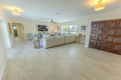 Coastal luxury meets resort-style living in this updated 3,000 on Gulf Harbors Golf Course in Florida - for sale on GolfHomes.com, golf home, golf lot