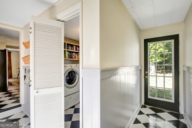 Welcome to this charming home full of character, nestled on a on Canongate At Flat Creek Club in Georgia - for sale on GolfHomes.com, golf home, golf lot