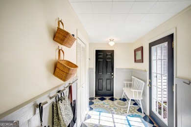 Welcome to this charming home full of character, nestled on a on Canongate At Flat Creek Club in Georgia - for sale on GolfHomes.com, golf home, golf lot
