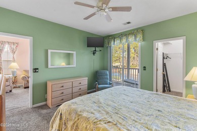 Welcome to your dream retreat! Nestled in the highly on Sandpiper Bay Golf and Country Club in North Carolina - for sale on GolfHomes.com, golf home, golf lot