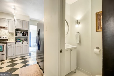 Welcome to this charming home full of character, nestled on a on Canongate At Flat Creek Club in Georgia - for sale on GolfHomes.com, golf home, golf lot