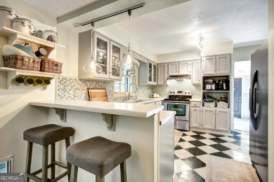 Welcome to this charming home full of character, nestled on a on Canongate At Flat Creek Club in Georgia - for sale on GolfHomes.com, golf home, golf lot
