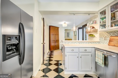 Welcome to this charming home full of character, nestled on a on Canongate At Flat Creek Club in Georgia - for sale on GolfHomes.com, golf home, golf lot