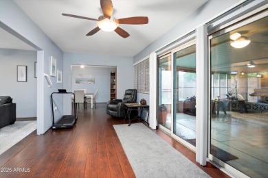 This lovely three-bedroom, two-bath home in Sun City features a on Sun City Country Club in Arizona - for sale on GolfHomes.com, golf home, golf lot