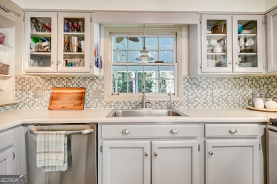 Welcome to this charming home full of character, nestled on a on Canongate At Flat Creek Club in Georgia - for sale on GolfHomes.com, golf home, golf lot