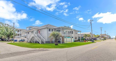 Welcome to this charming 3 BR, 3 Bath coastal retreat located in on Beachwood Golf Club in South Carolina - for sale on GolfHomes.com, golf home, golf lot