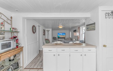 Welcome to this charming 3 BR, 3 Bath coastal retreat located in on Beachwood Golf Club in South Carolina - for sale on GolfHomes.com, golf home, golf lot