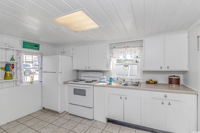 Welcome to this charming 3 BR, 3 Bath coastal retreat located in on Beachwood Golf Club in South Carolina - for sale on GolfHomes.com, golf home, golf lot