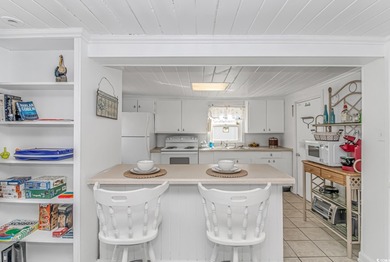 Welcome to this charming 3 BR, 3 Bath coastal retreat located in on Beachwood Golf Club in South Carolina - for sale on GolfHomes.com, golf home, golf lot