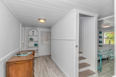 Welcome to this charming 3 BR, 3 Bath coastal retreat located in on Beachwood Golf Club in South Carolina - for sale on GolfHomes.com, golf home, golf lot