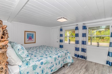 Welcome to this charming 3 BR, 3 Bath coastal retreat located in on Beachwood Golf Club in South Carolina - for sale on GolfHomes.com, golf home, golf lot