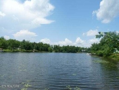 Beautiful over 1/2 Acre Lakefront Lot! Level to Gently sloping on Lake Tansi Village Country Club in Tennessee - for sale on GolfHomes.com, golf home, golf lot