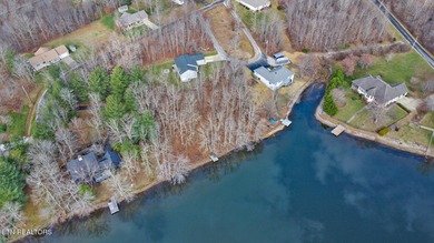Beautiful over 1/2 Acre Lakefront Lot! Level to Gently sloping on Lake Tansi Village Country Club in Tennessee - for sale on GolfHomes.com, golf home, golf lot