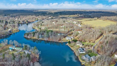 Beautiful over 1/2 Acre Lakefront Lot! Level to Gently sloping on Lake Tansi Village Country Club in Tennessee - for sale on GolfHomes.com, golf home, golf lot