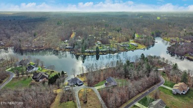 Beautiful over 1/2 Acre Lakefront Lot! Level to Gently sloping on Lake Tansi Village Country Club in Tennessee - for sale on GolfHomes.com, golf home, golf lot