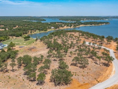 Enjoy 2.0 acres of lakeside tranquility tucked away in a cove on Twisted Oaks Golf Club in Texas - for sale on GolfHomes.com, golf home, golf lot