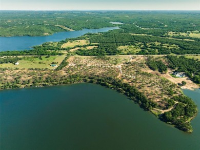 Enjoy 2.0 acres of lakeside tranquility tucked away in a cove on Twisted Oaks Golf Club in Texas - for sale on GolfHomes.com, golf home, golf lot