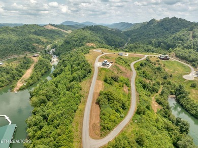 Partially cleared 0.42-acre lot in the desirable Lake Norris on Woodlake Golf Club in Tennessee - for sale on GolfHomes.com, golf home, golf lot